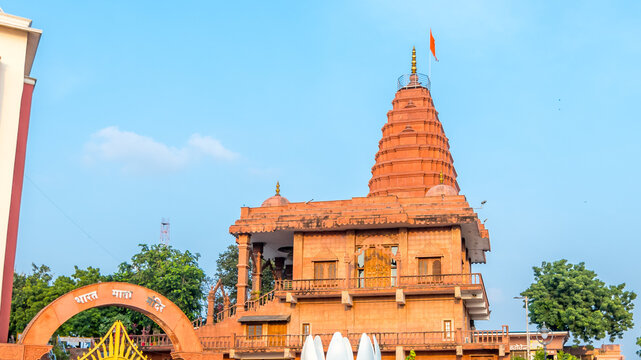 Mahakaleshwar temple spire with devotees gathering