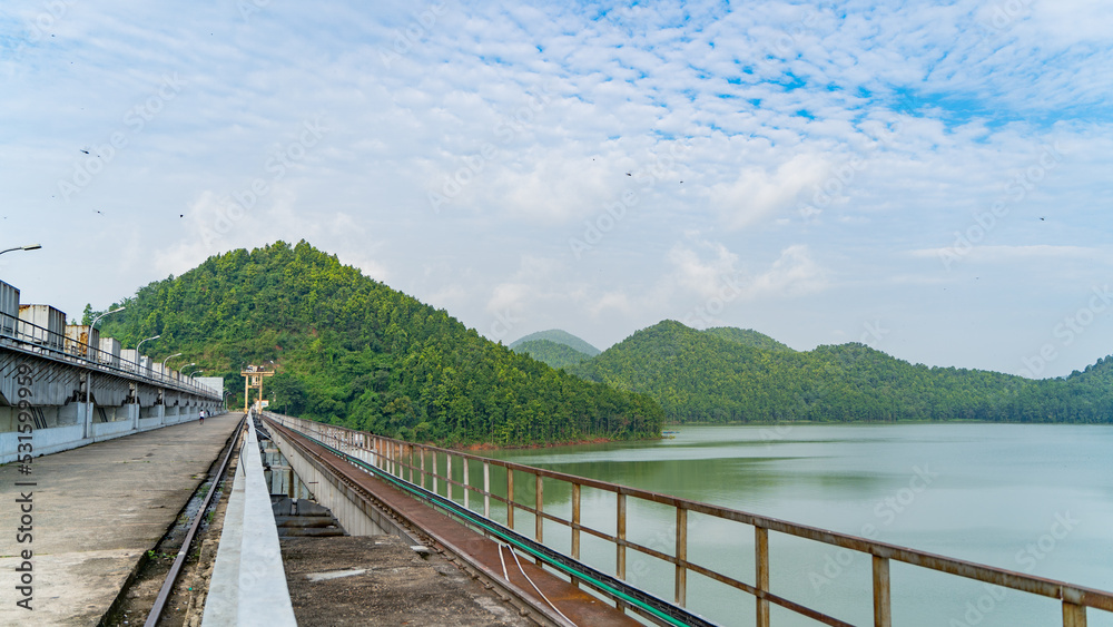 Aerial view of Chandil Dam's massive water reservoir and spillway gates