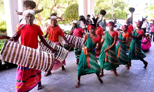 Adivasi artists in rhythmic Dhimsa dance at Araku.