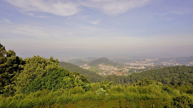 Among the top places to visit in Ooty, Doddabetta Peak provides breathtaking panoramic valley views.