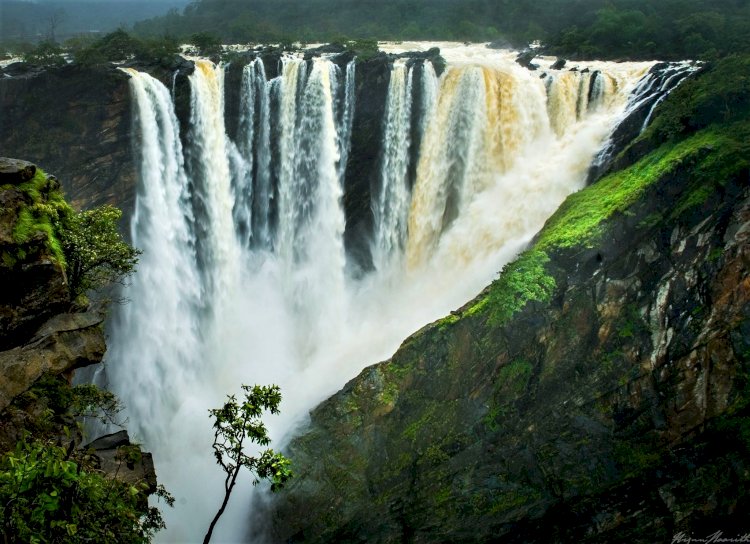 The Coorg City Page includes Jog Falls cascading over rocky cliffs nearby