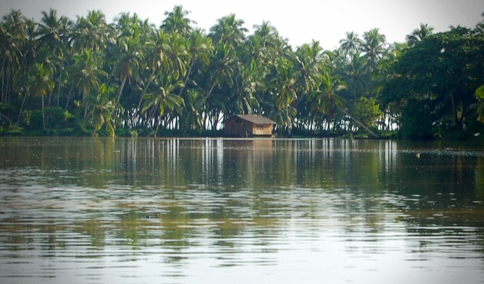 Peaceful riverfront with boat rides through green landscapes