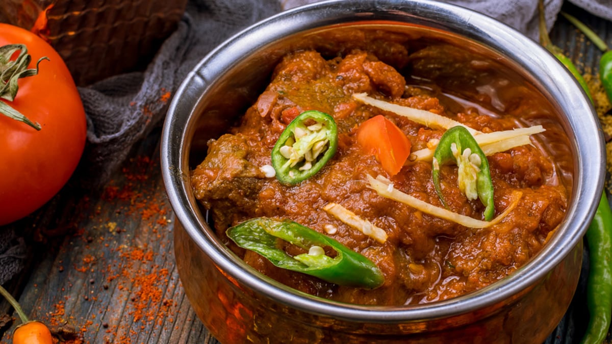 A creamy, spiced meat curry slow-cooked in a rich gravy.