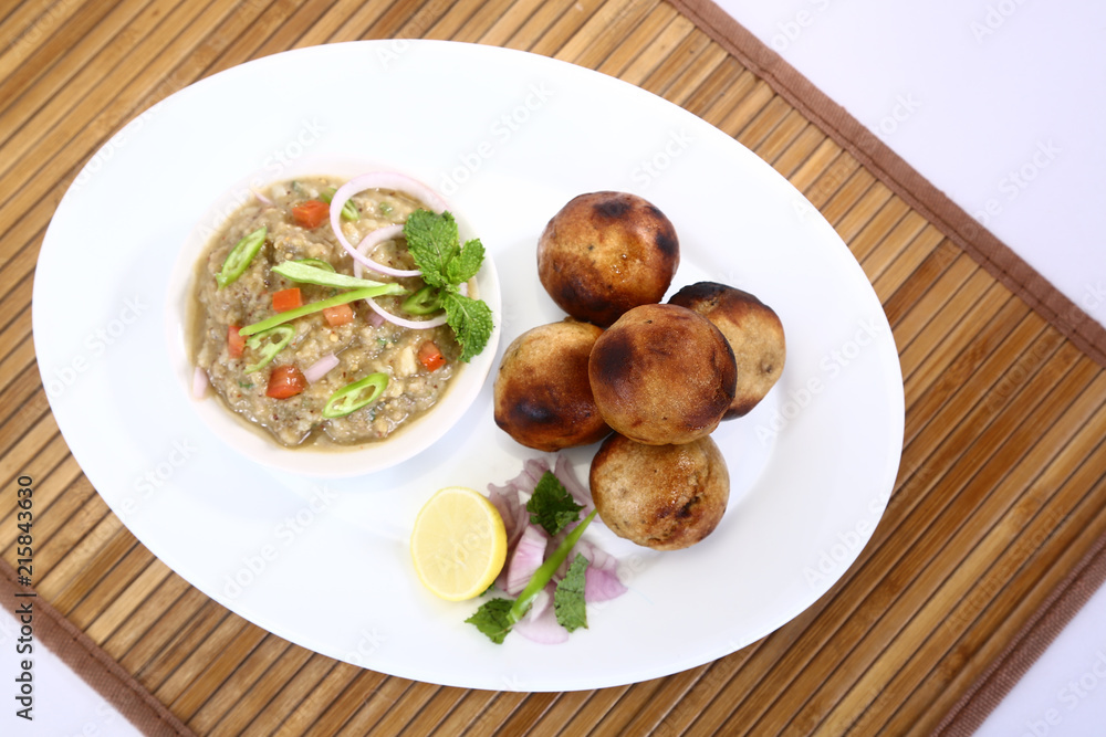 Traditional Bihari litti chokha served on leaf plate