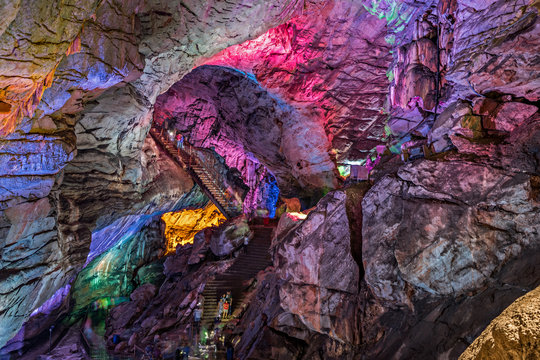 Illuminated limestone wonders inside Borra Caves, explored on our city page Visakhapatnam geological marvels.