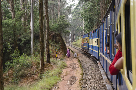 UNESCO-listed toy train chugging through hills, iconic to Ooty City Page.
