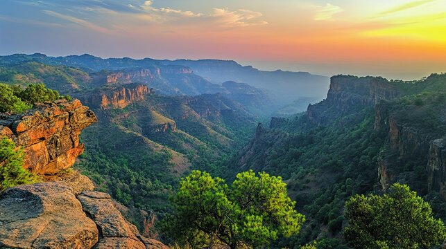 Scenic waterfalls and lush forests in Pachmarhi, Madhya Pradesh.