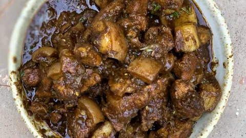 Spicy Pandi Curry with tender pork pieces in dark gravy