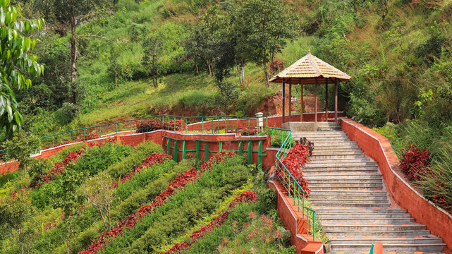 Raja’s Seat, a must-visit sunset viewpoint in Coorg, offering panoramic valley views.