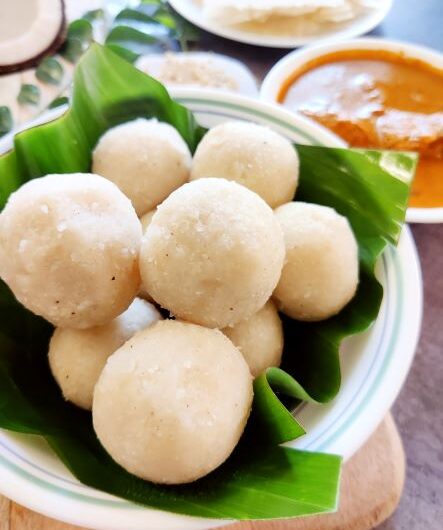 Steamed Kadumbuttu rice balls served on banana leaf