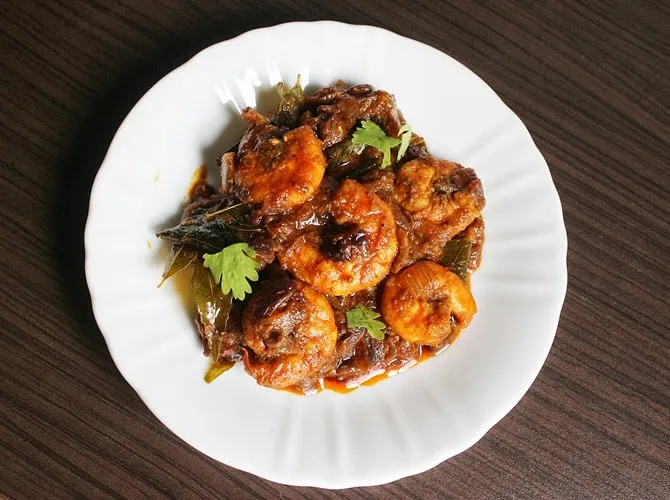 Flavorful prawn curry with tamarind and spices.