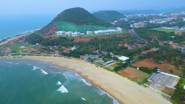 Places to visit in Visakhapatnam: Rushikonda Beach’s waves and water sports like surfing and jet skiing.