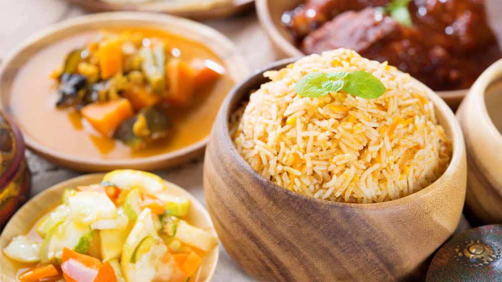 Enjoying traditional Awadhi cuisine in Lucknow is a flavorful experience.
