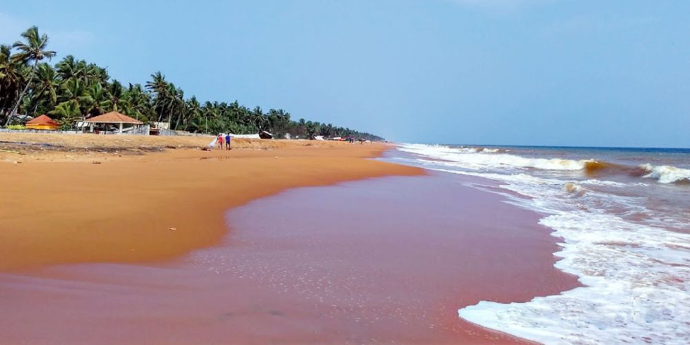 Serene Places to Visit in Thiruvananthapuram feature this beach known for its giant mermaid statue and sunset views.