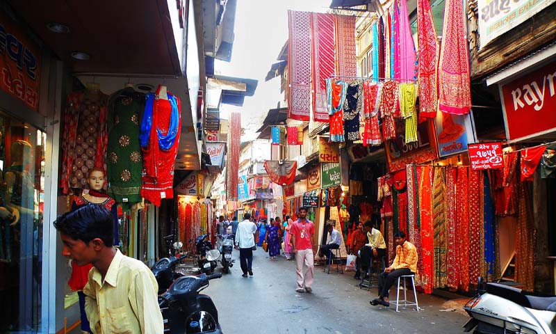 Colorful fabric market with traditional Maheshwari sarees