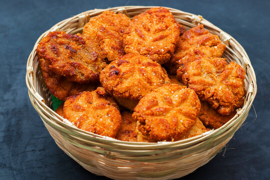 Golden-brown Thekua cookies, a sweet Chhath Puja specialty.