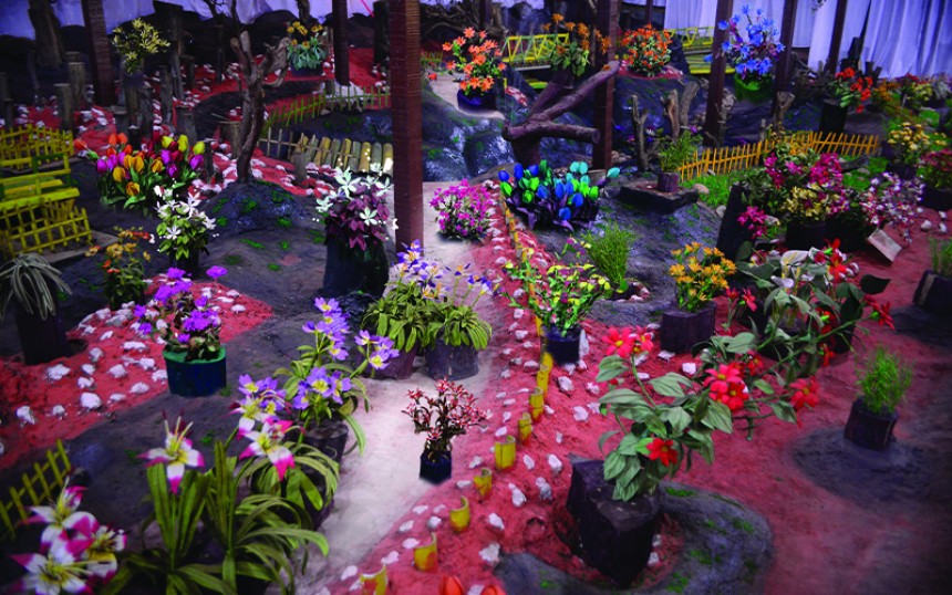 A unique artistic attraction among places to visit in Ooty, showcasing handcrafted thread flowers.