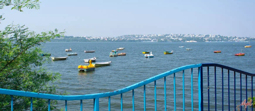 Twin lakes of Bhopal, surrounded by greenery and ghats.
