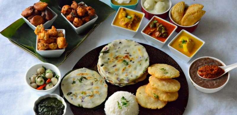 Traditional Chhattisgarhi thali in Raipur with dishes like Chila and Aamat