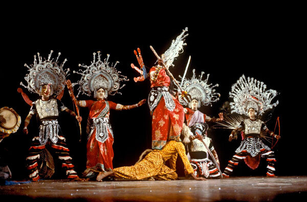 Musicians playing traditional drums and wind instruments for a Chhau dance performance in Jamshedpur.