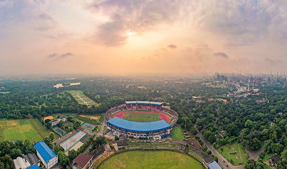 The main football field and stadium at the JRD Tata Sports Complex.
