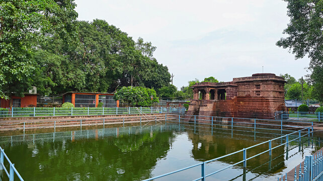 Ancient Mahadev Temple in Raipur dedicated to Lord Shiva, surrounded by lush greenery