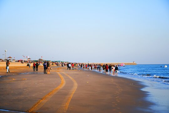 Serene Mandvi Beach, perfect for relaxation and water sports.