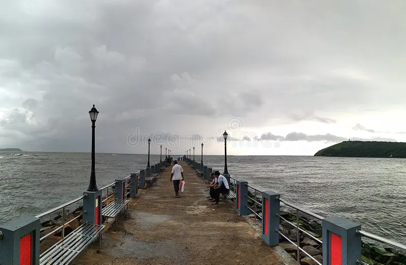 Ratnagiri Jetty, a bustling fishing port with boats and fresh seafood.