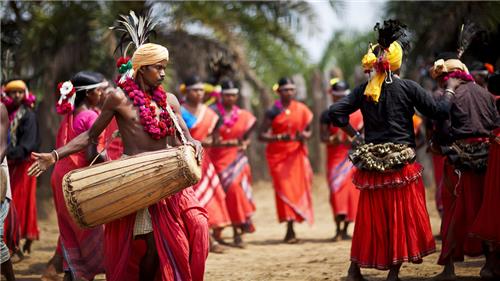 Raut Nacha folk dancers with peacock feathers and rhythmic movements