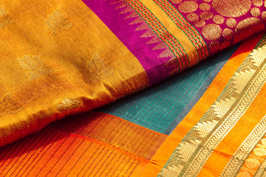 Handwoven Odisha sarees with intricate ikat and bomkai designs, showcasing Bhubaneswar’s rich textile heritage.