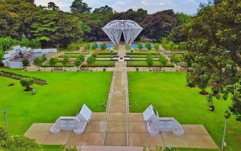 People relaxing on the lawns of Sir Dorabji Tata Park in the heart of Jamshedpur.