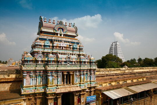 The towering gopurams of Sri Ranganathaswamy Temple in Srirangam, adorned with vibrant Dravidian sculptures and dedicated to Lord Ranganatha (Vishnu).