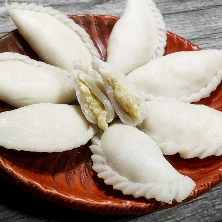 Pitha is a dish made wth jaggery and rice flour very mmuch famous in whole Assam.