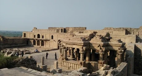 Detailed stone carvings and sculptures on the ancient temples of Padavali.