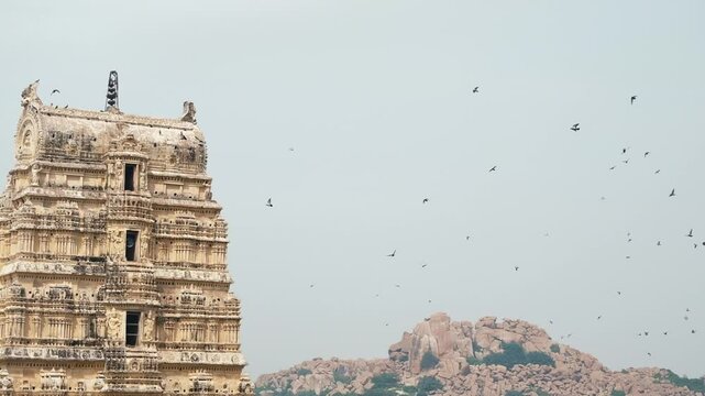 The main gopuram of the historic Virupaksha Temple, a core part of the Hampi ruins and a testament to South India's Best Temples.