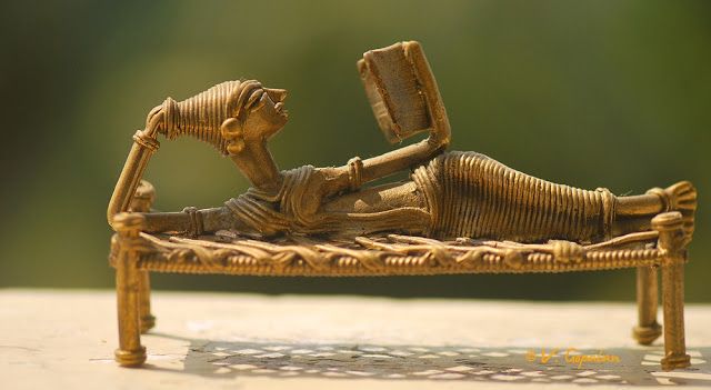 A detailed view of a Dhokra art elephant figurine.