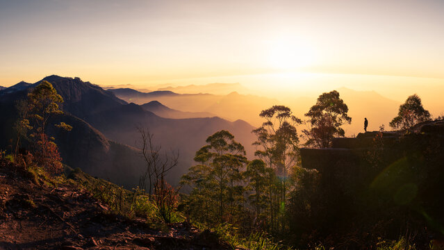 The dramatic Dolphin's Nose rock outcrop offering breathtaking valley views in Kodaikanal.