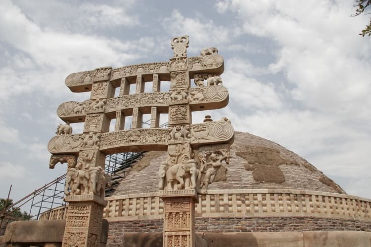 Intricately carved Eastern Gateway torana at places to visit in Sanchi's main stupa