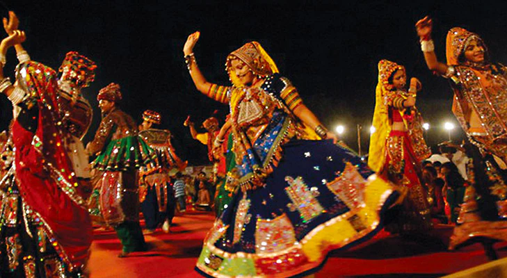 Bikaner women performing the traditional and graceful Ghoomar dance.