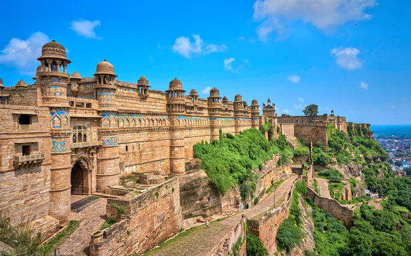 The imposing outer walls and blue-tiled facade of Man Singh Palace within the grand Gwalior Fort, a formidable structure among Central India's Famous Archaeological Marvels.