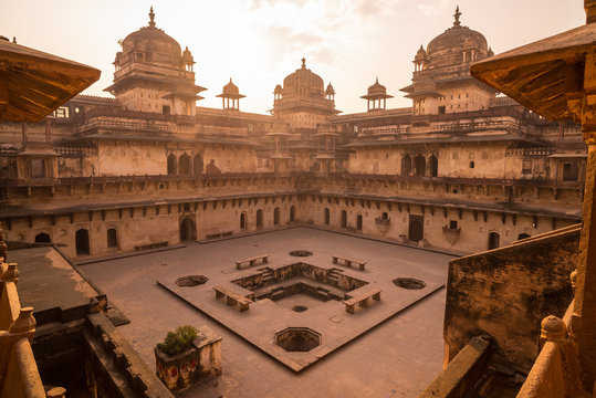 The majestic facade of the historic Jahangir Mahal in Orchha, showcasing its blend of Rajput and Mughal architecture.