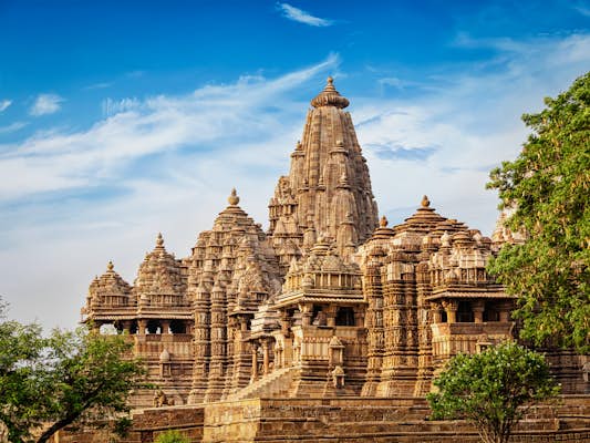 The soaring spires and intricately sculpted exterior of Kandariya Mahadeva Temple, a zenith of Nagara architecture and one of Central India's Famous Temples.