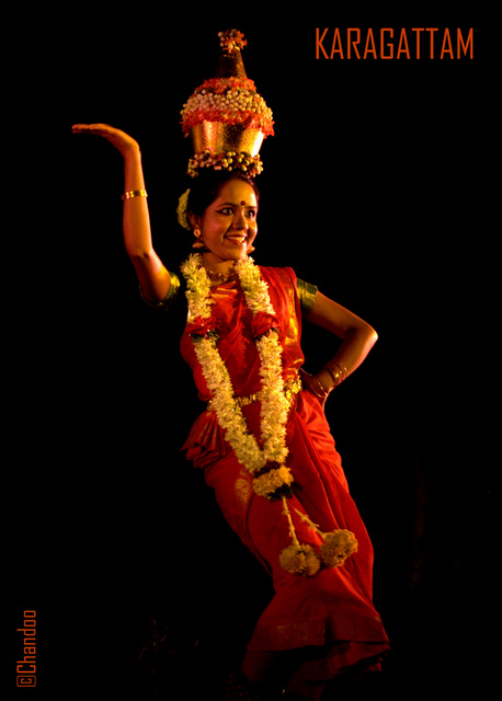 Performer balancing a pot during the vibrant Karagattam folk dance.