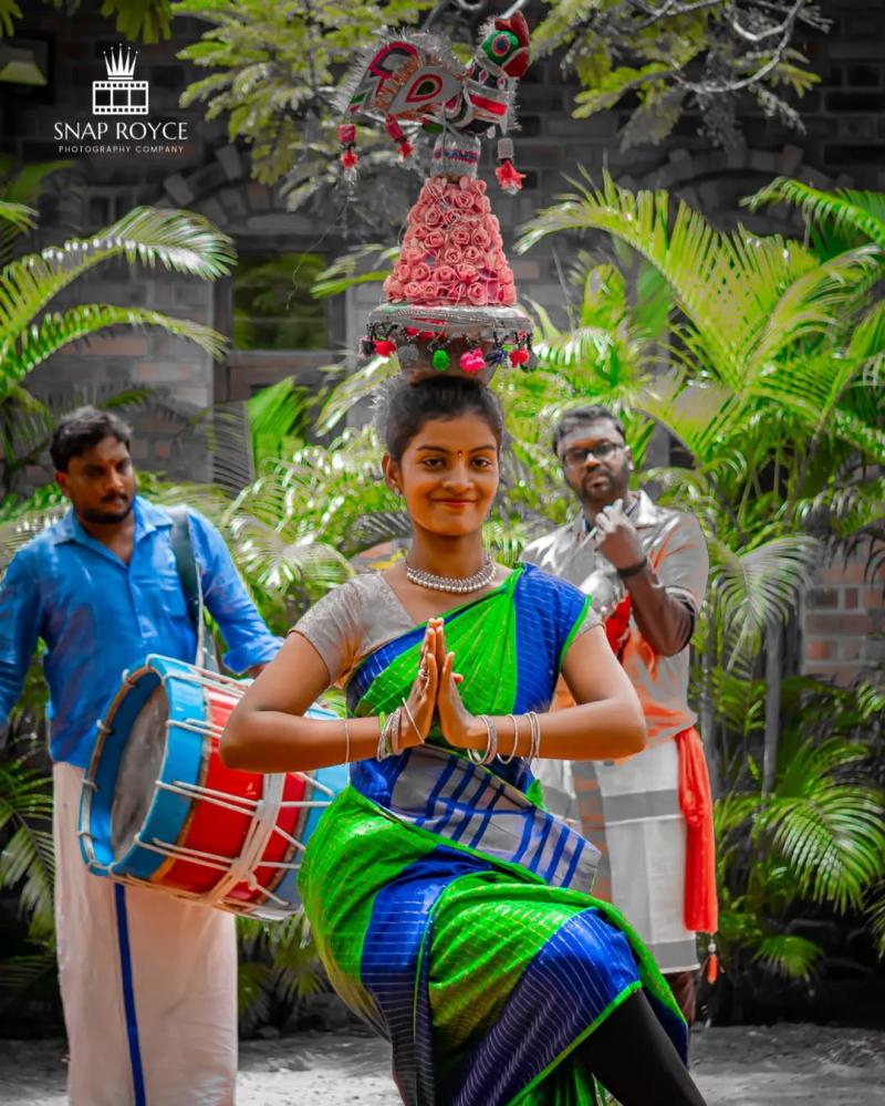 A dynamic performance of Karakattam, a traditional Tamil dance with a pot, in Kodaikanal.