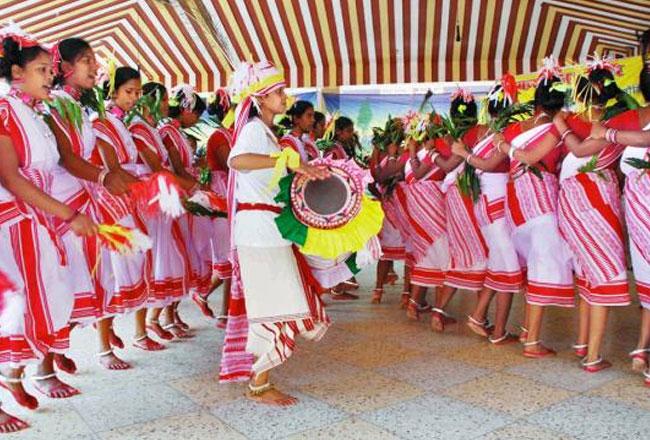 Tribal dancers performing the Karma Naach folk dance.