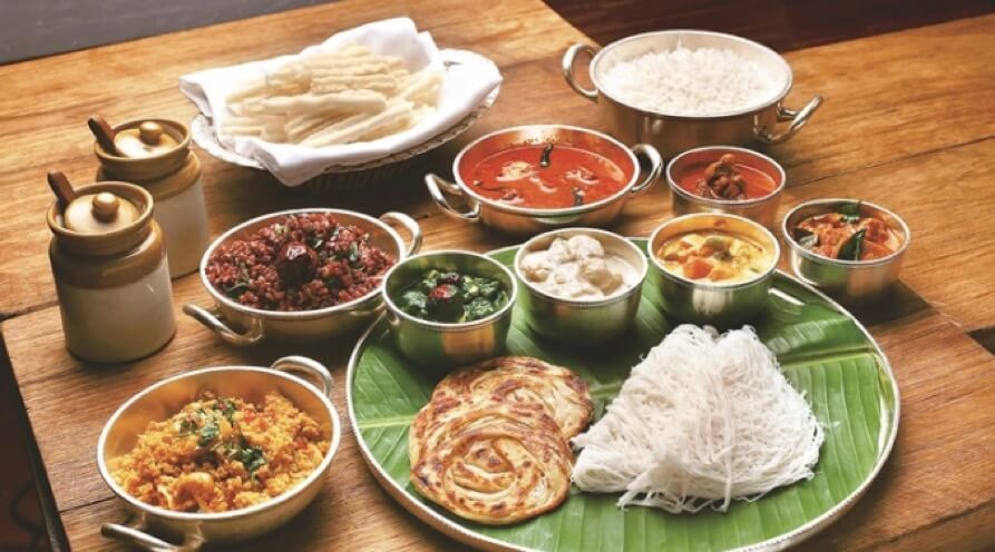 A traditional Kongunadu meal served on a banana leaf.