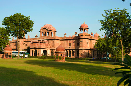 Bikaner the magnificent red sandstone facade of Lalgarh Palace, showcasing Rajput architecture.