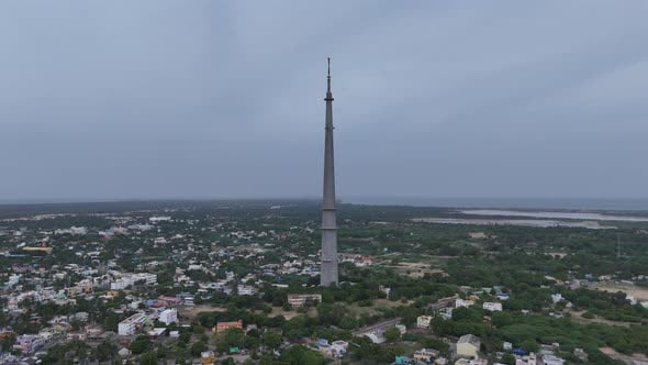 The tall, slender Rameswaram TV Tower against a clear blue sky.
