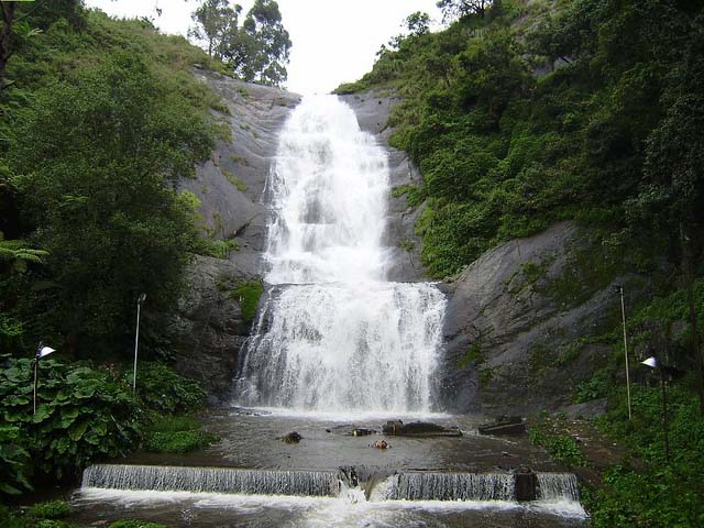 Waterfall cascading down the rocks on the ghat road near Kodaikanal, known as Silver Cascade Falls.