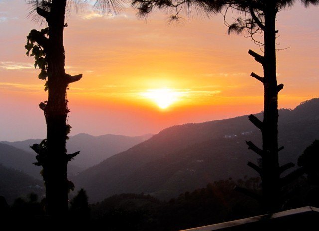 Visitors gathering to watch a spectacular sunset at Sunset Point in Kasauli.